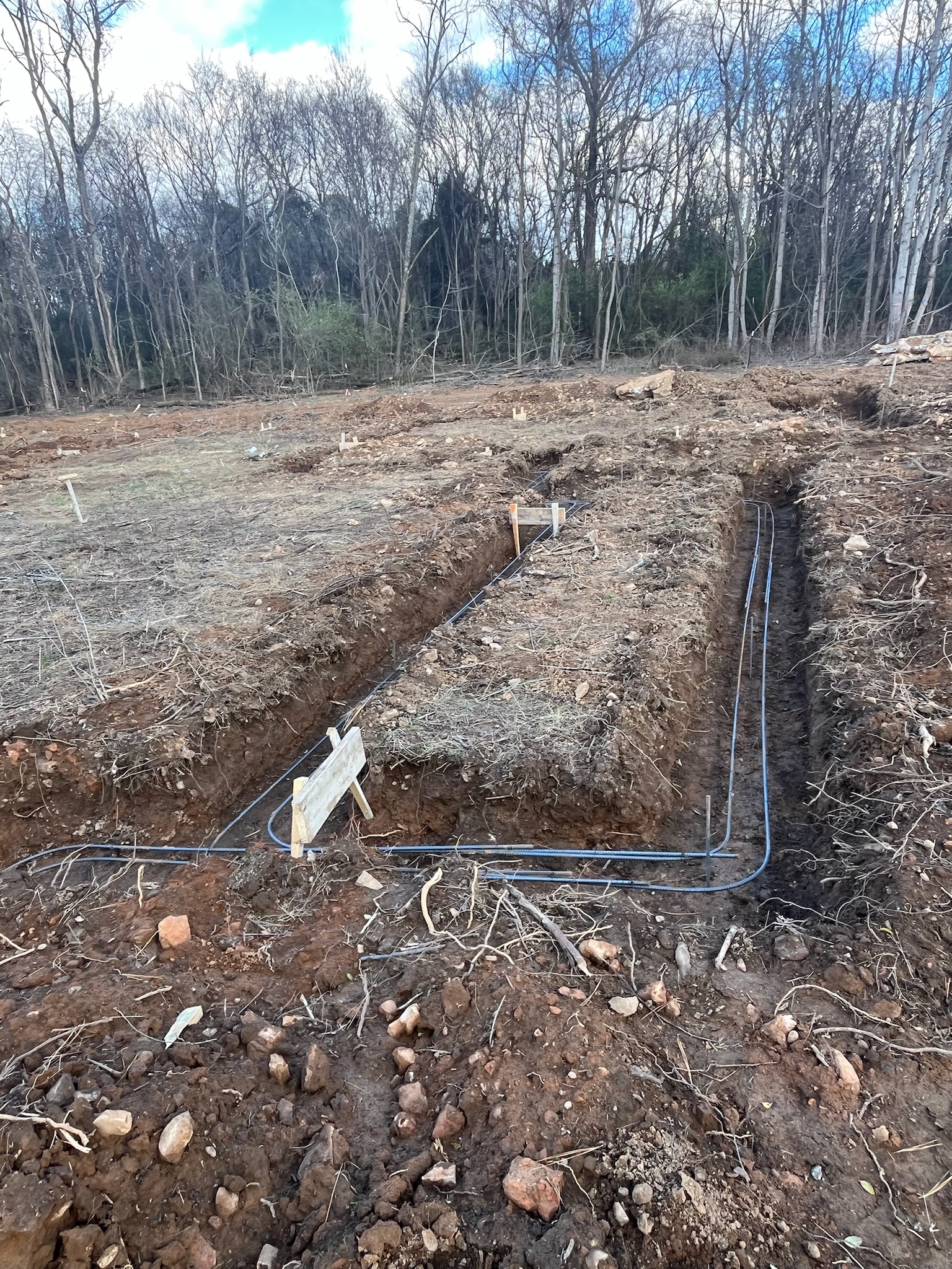 Trenches and site prep at Burwell Road project.
