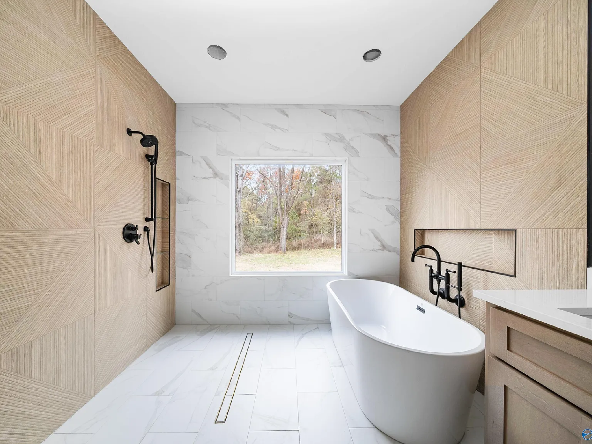Featured custom home bathroom with freestanding tub.